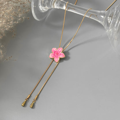 Pink Enamel and Goldtone Flower Tassel Pendant Necklace, vintage-inspired design, detail close-up
