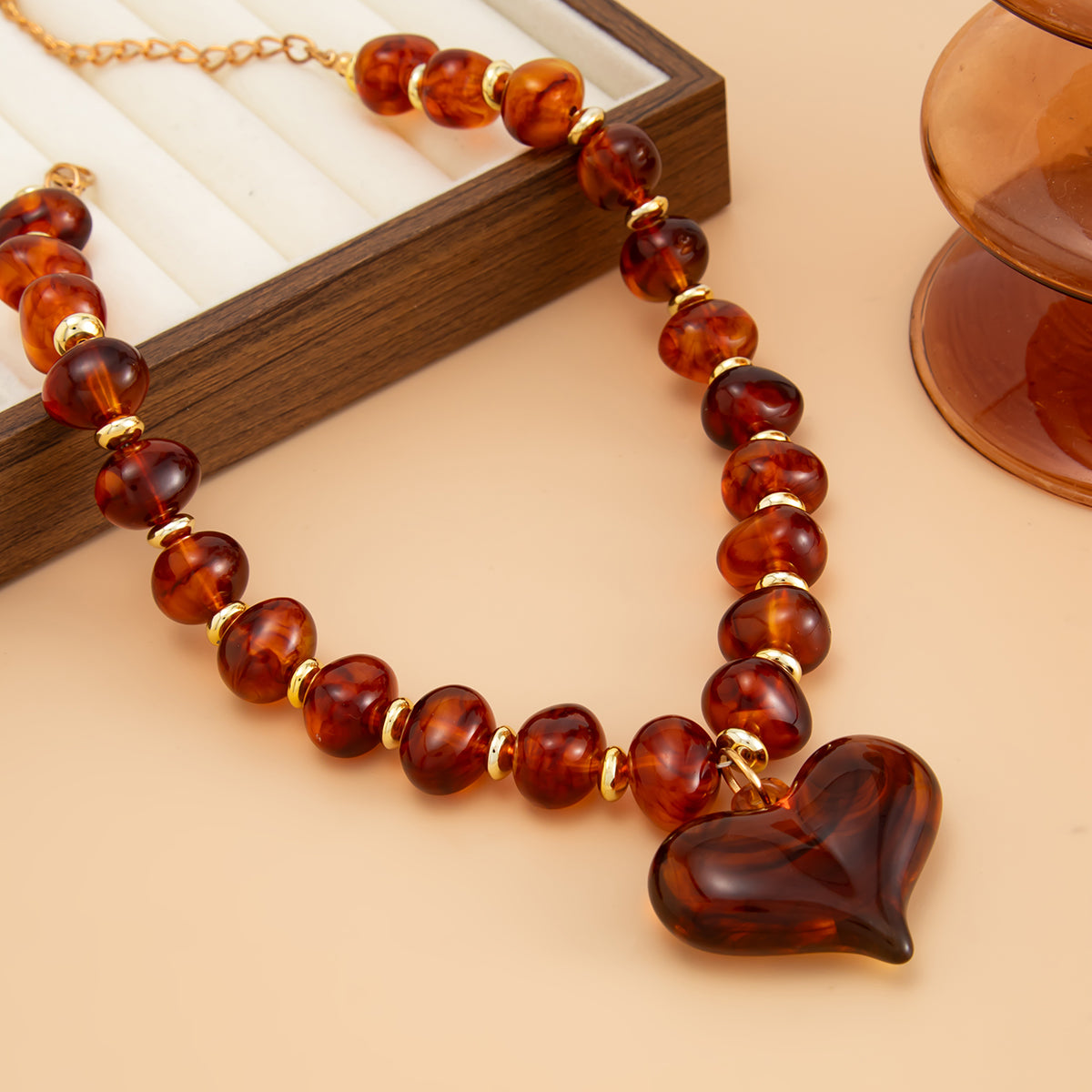 Amber Resin and Goldtone Bead Chain Heart Pendant Necklace, vintage-inspired design, detail close-up
