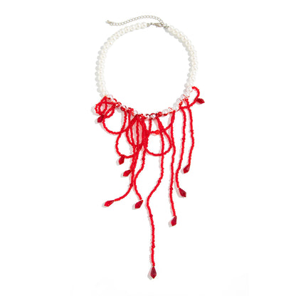 Red Acrylic and Enamel Pearl Silvertone Tassel Necklace, dainty minimalist design, front view