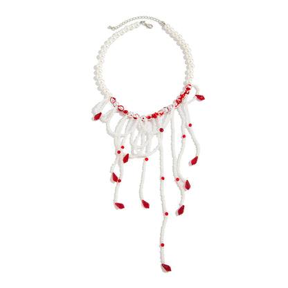 White Acrylic and Enamel Pearl Silvertone Tassel Necklace, dainty minimalist design, front view