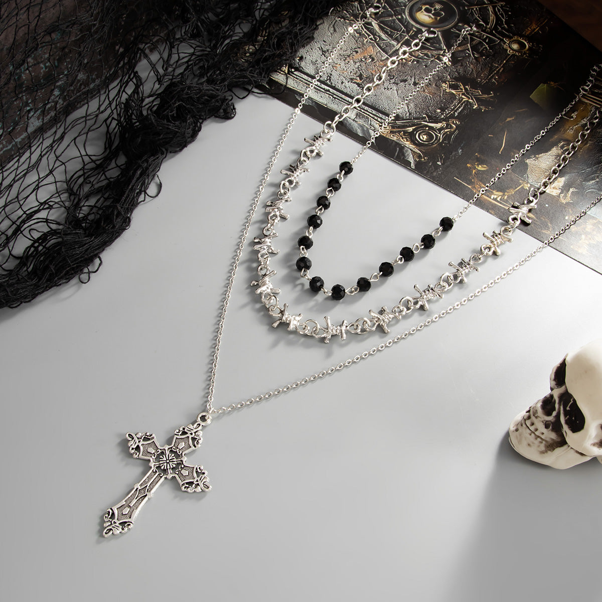 Black Resin and Silvertone Knot Station Cross Pendant Necklace Set, silver pendant necklace for women, side view