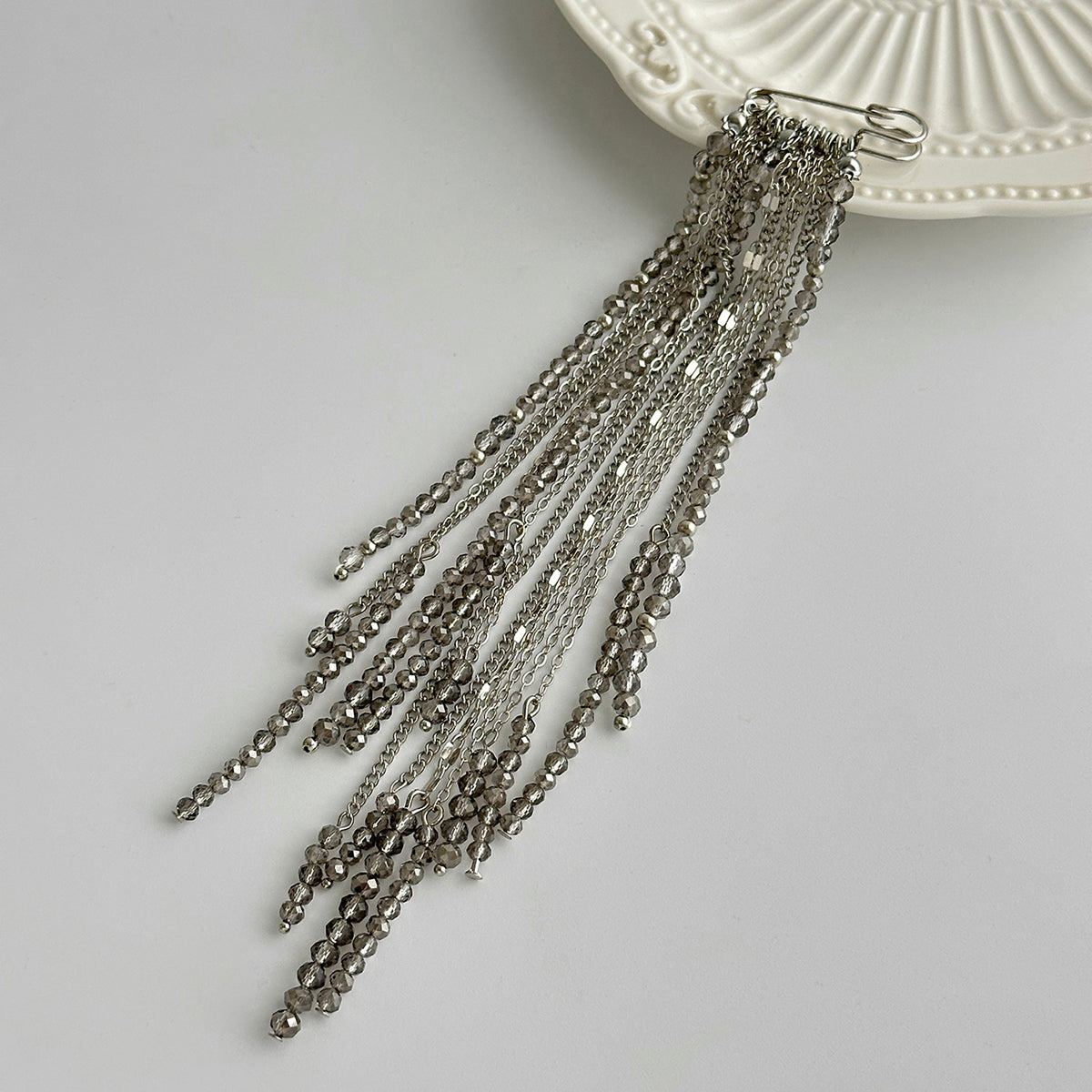 Gray Acrylic and Silvertone Tassel Pin Brooch, vintage-inspired design, side view
