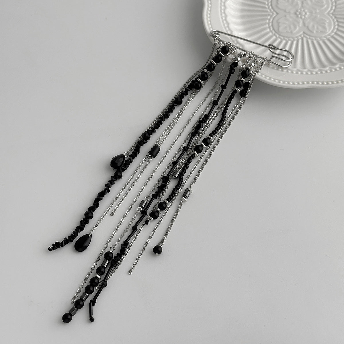 Black Crystal and Acrylic Silvertone Tassel Pin Brooch, dainty minimalist design, side view