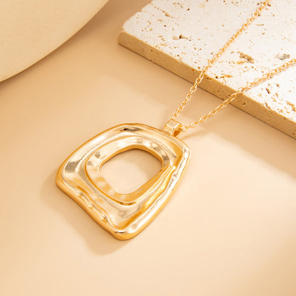 Goldtone Open Dual-Trapezium Pendant Statement Necklace, vintage-inspired design, side view