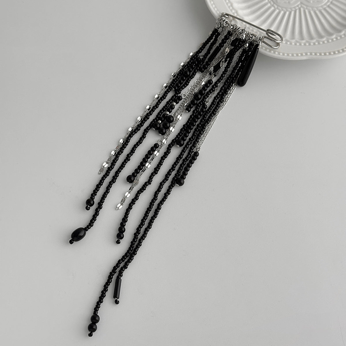 Black Crystal and Acrylic Silvertone Drop Tassel Pin Brooch, botanical inspired, side view