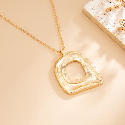 Goldtone Open Dual-Trapezium Pendant Statement Necklace, vintage-inspired design, detail close-up