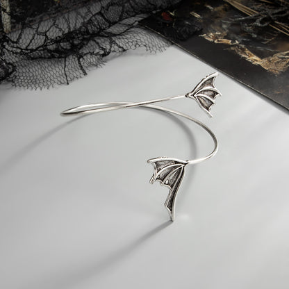 Silvertone Dual Bat Wing Bypass Arm Cuff, botanical inspired, detail close-up