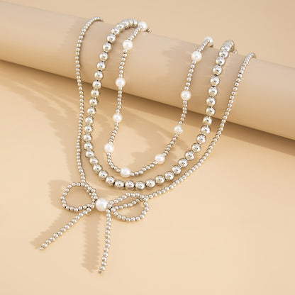 Pearl and Silvertone Beads Chain Bow Pendant Necklace Set, silver pendant necklace for women, detail close-up
