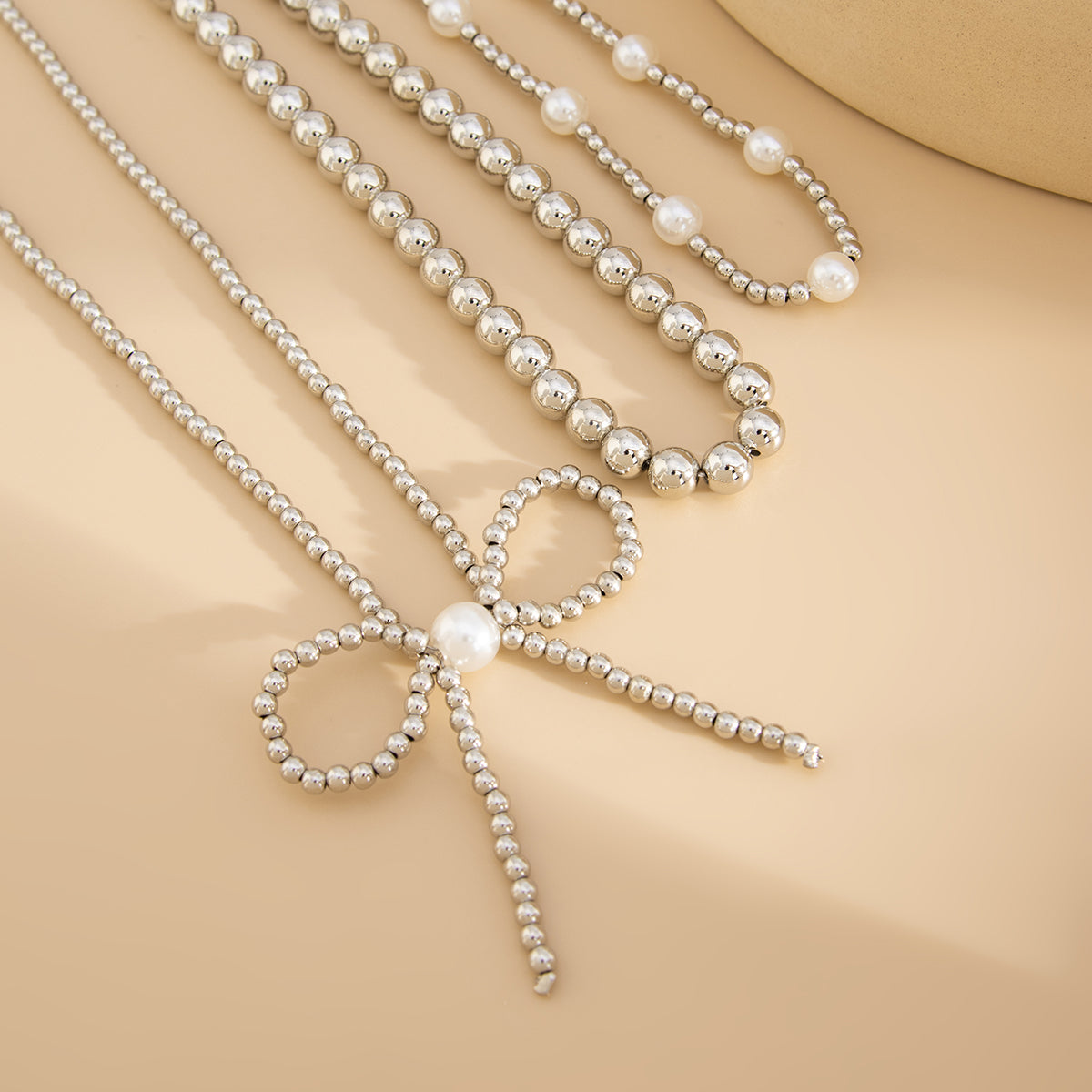 Pearl and Silvertone Beads Chain Bow Pendant Necklace Set, silver pendant necklace for women, lifestyle look