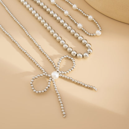 Pearl and Silvertone Beads Chain Bow Pendant Necklace Set, silver pendant necklace for women, lifestyle look
