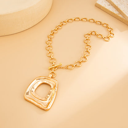 Goldtone ‌Open Trapezium Statement Pendant Necklace, elegant gift for her, side view