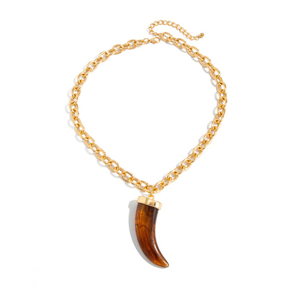 Red Resin and Goldtone Wolf Tooth Pendant Necklace, botanical inspired, front view