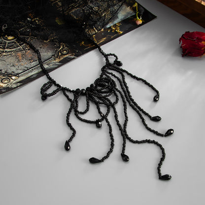 Black Acrylic and Silvertone Tassel Necklace, everyday style, detail close-up