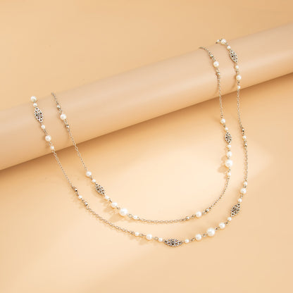 Pearl and Silvertone Butterfly Station Long Necklace Set, silver pendant necklace for women, side view