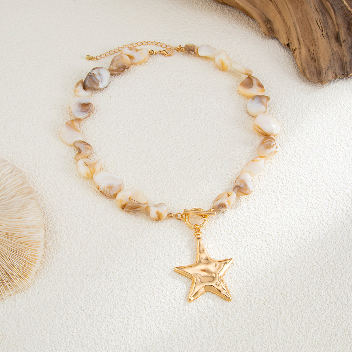 Shell and Goldtone Starfish Pendant Necklace, botanical inspired, side view