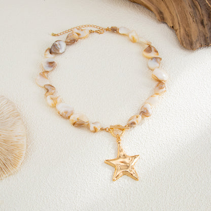 Shell and Goldtone Starfish Pendant Necklace, botanical inspired, side view