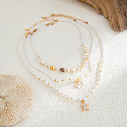 Shell and Pearl Enamel Goldtone Starfish Pendant Necklace Set, gold pendant necklace for women, side view