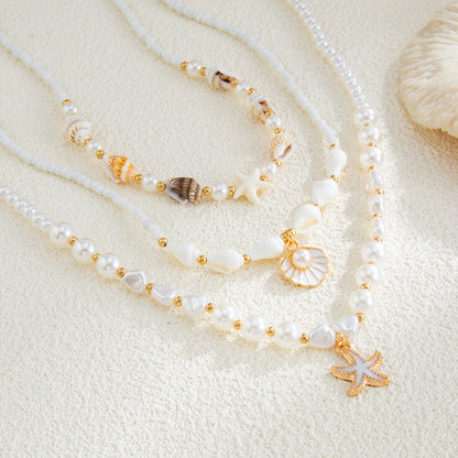 Shell and Pearl Enamel Goldtone Starfish Pendant Necklace Set, gold pendant necklace for women, detail close-up