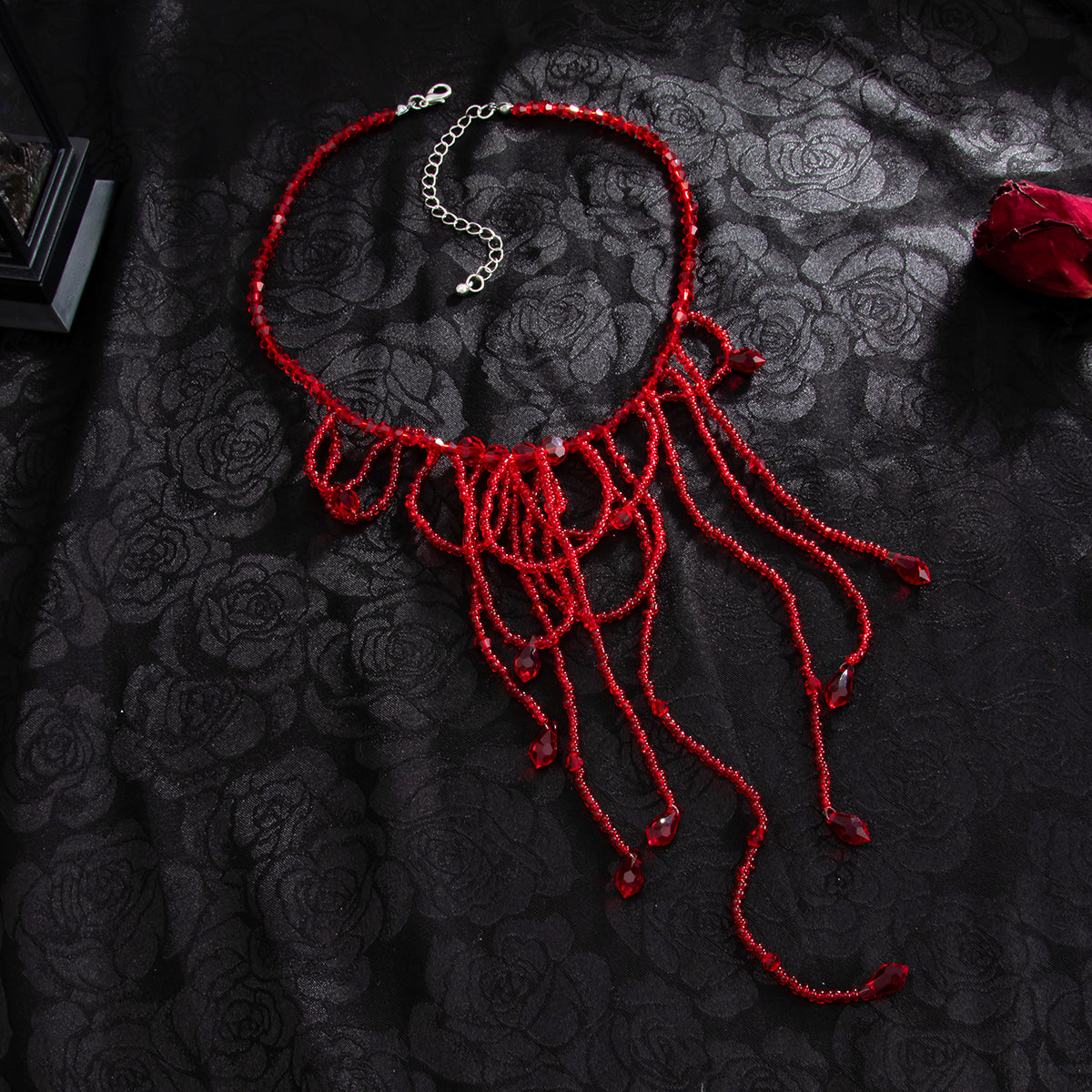 Red Acrylic and Silvertone Tassel Necklace, everyday style, side view