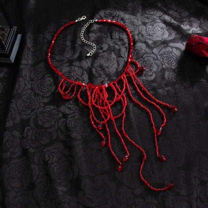 Red Acrylic and Silvertone Tassel Necklace, everyday style, side view