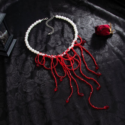 Red Acrylic and Enamel Pearl Silvertone Tassel Necklace, dainty minimalist design, side view