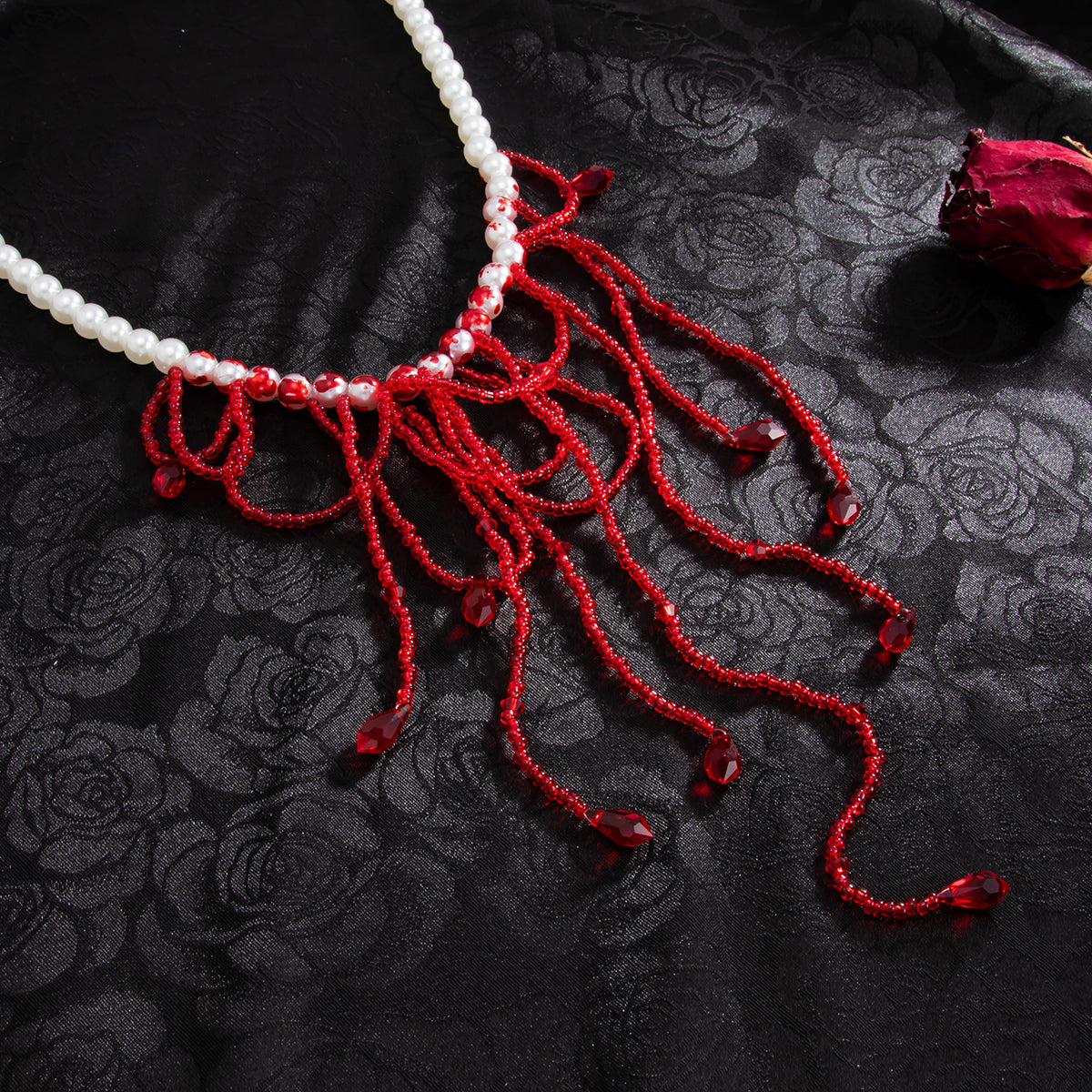 Red Acrylic and Enamel Pearl Silvertone Tassel Necklace, dainty minimalist design, detail close-up