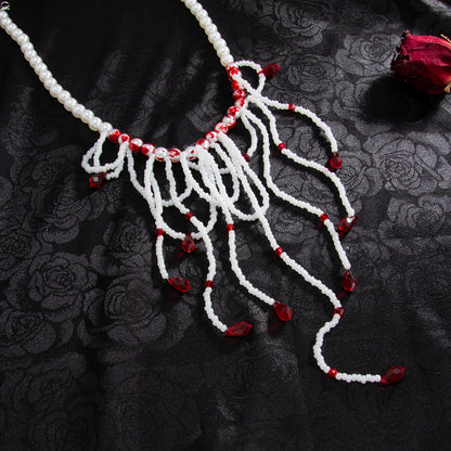 White Acrylic and Enamel Pearl Silvertone Tassel Necklace, dainty minimalist design, detail close-up