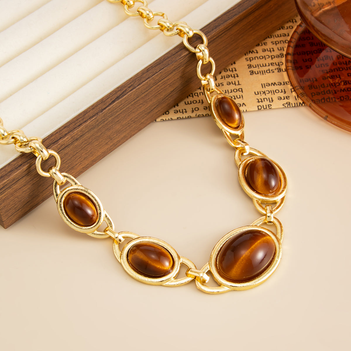 Tiger's Eye‌ and Goldtone Graduated Oval Station Necklace, vintage-inspired design, side view