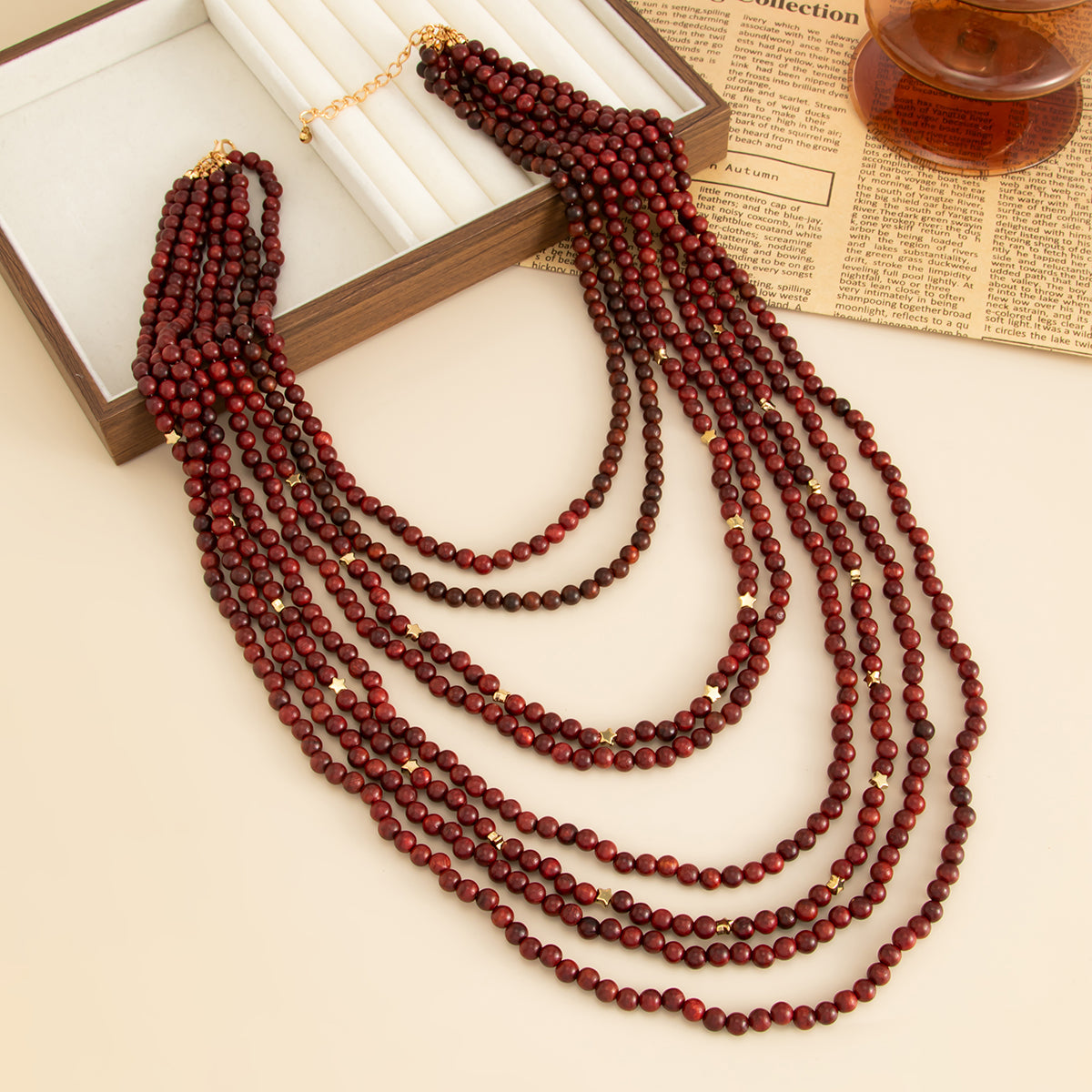 Red Wood and Goldtone Star Beaded Chain Layered Necklace, vintage-inspired design, side view
