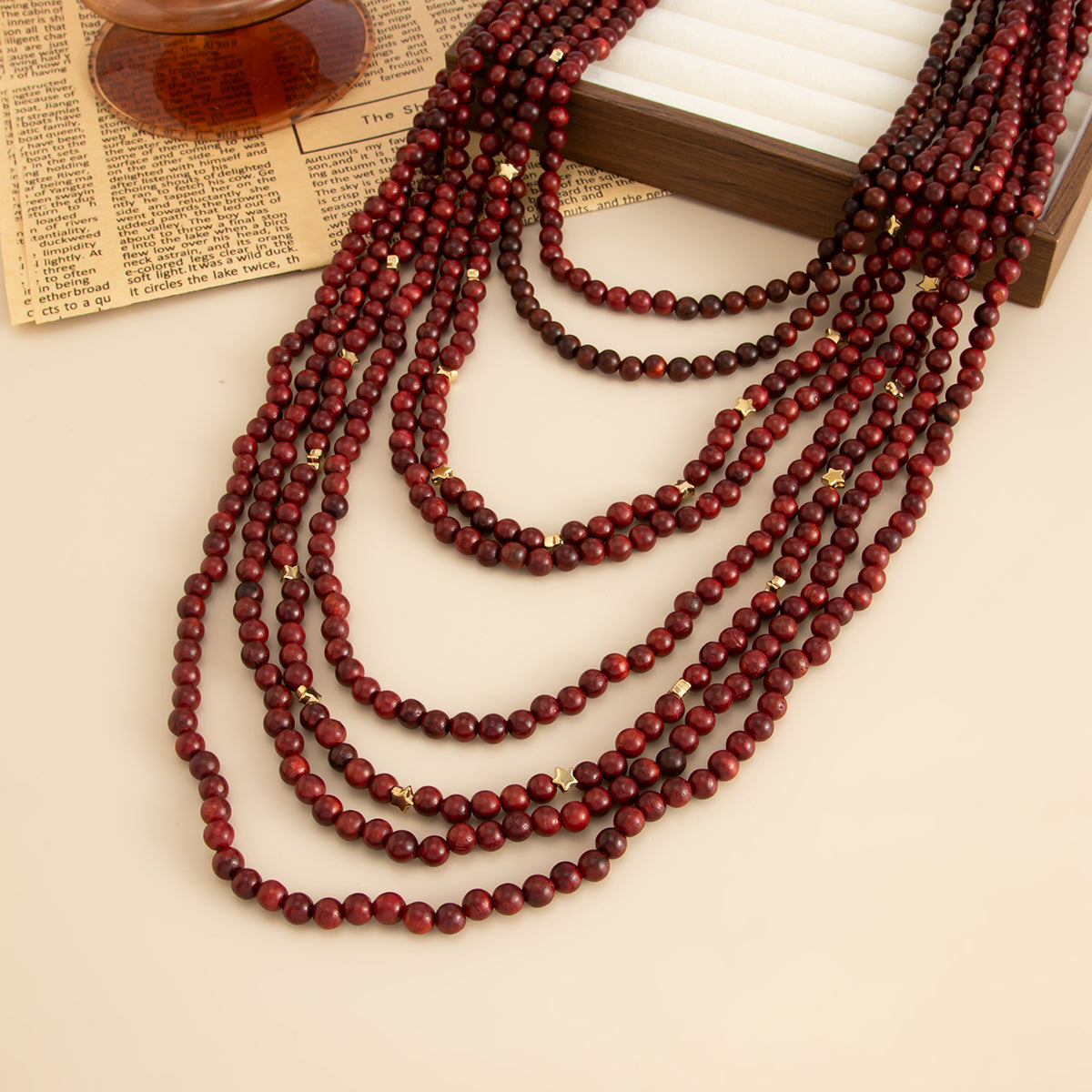 Red Wood and Goldtone Star Beaded Chain Layered Necklace, vintage-inspired design, detail close-up