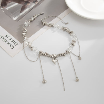 Clear Resin and Silvertone Heart Tassel Necklace, everyday style, side view