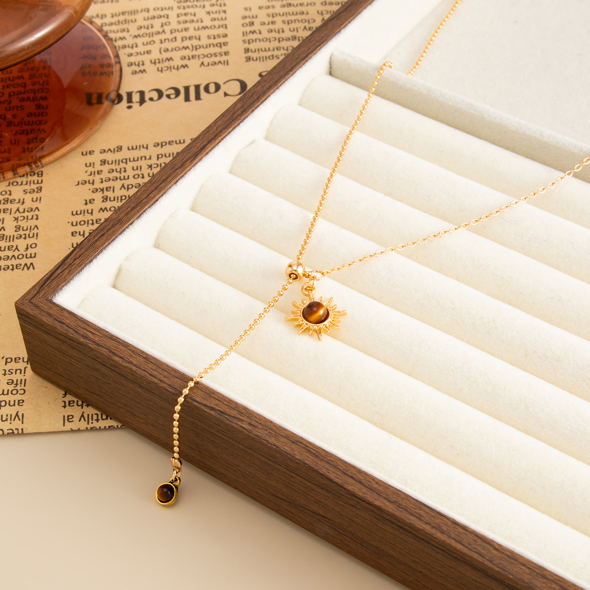 Tiger's Eye‌ and Goldtone Sun Lariat Necklace, vintage-inspired design, side view