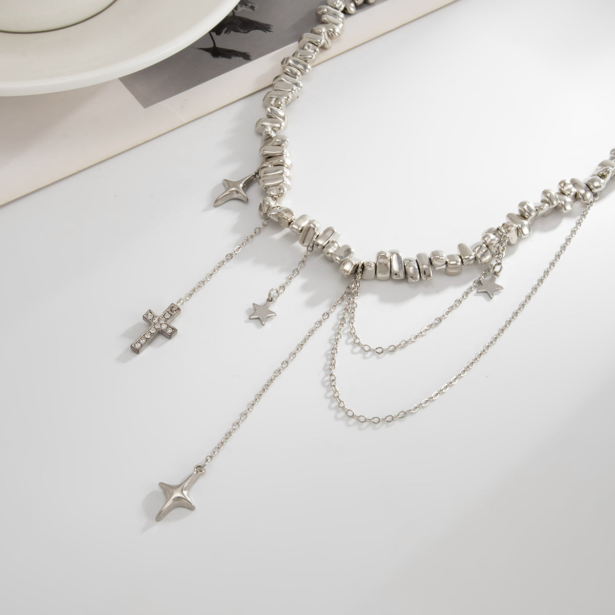 Cubic Zirconia and Silvertone Cross Star Drop Necklace, vintage-inspired design, detail close-up