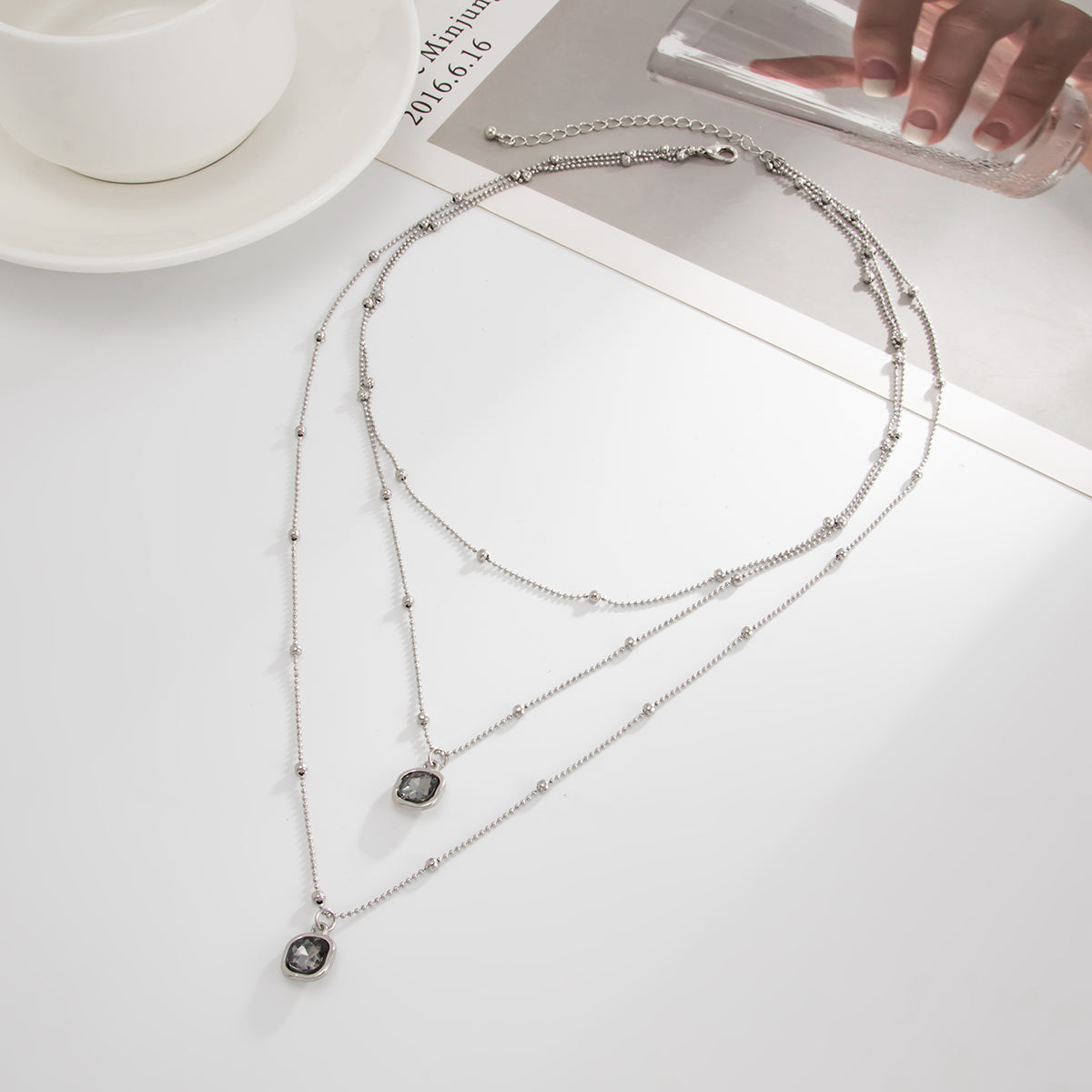 Crystal and Silvertone Beaded Chain Pendant Layered Necklace, dainty minimalist design, side view
