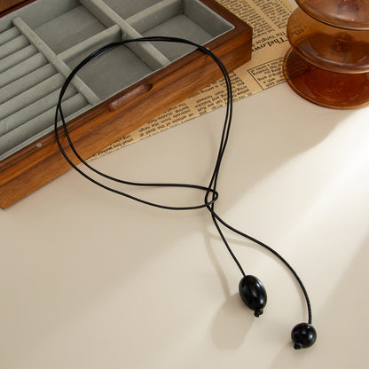 Black Resin and Polyster Dual-Drop Long Necklace, everyday style, side view