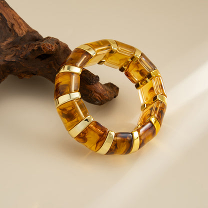Light Amber Resin and Goldtone Oval Station Stretch Bracelet, elegant gift for her, side view