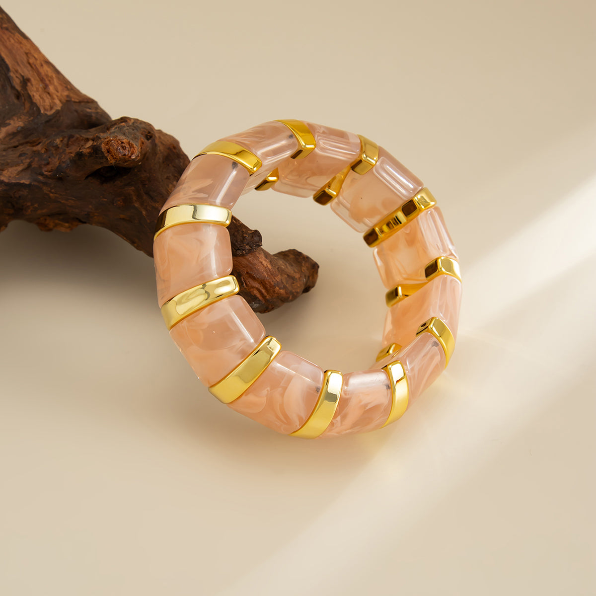 Pink Resin and Goldtone Oval Station Stretch Bracelet, dainty minimalist design, side view
