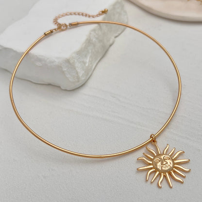 Goldtone Sun Pendant Choker, vintage-inspired design, side view