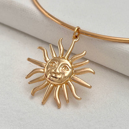 Goldtone Sun Pendant Choker, vintage-inspired design, detail close-up