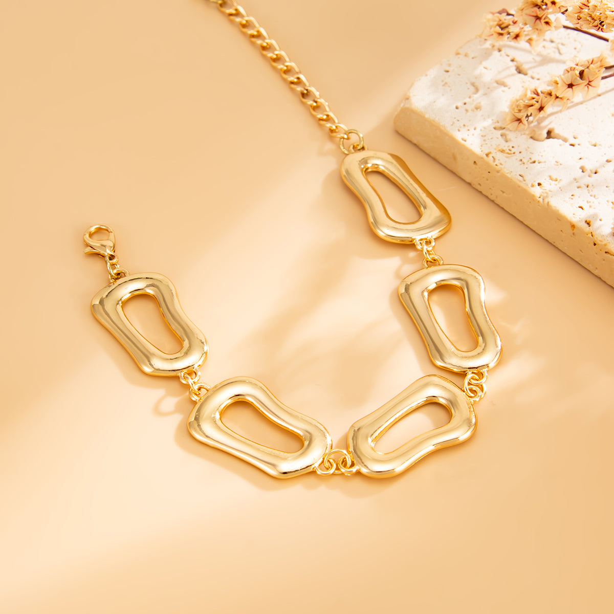 Goldtone Open Irregular Charm Link Bracelet, gold bracelet for women, elegant gift for her, side view