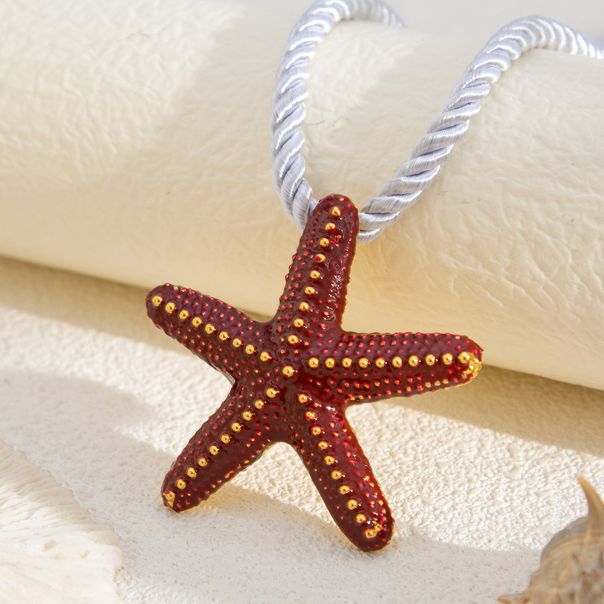 Thick Polyster Cord and Red Enamel Goldtone Starfish Statement Necklace, botanical inspired, side view
