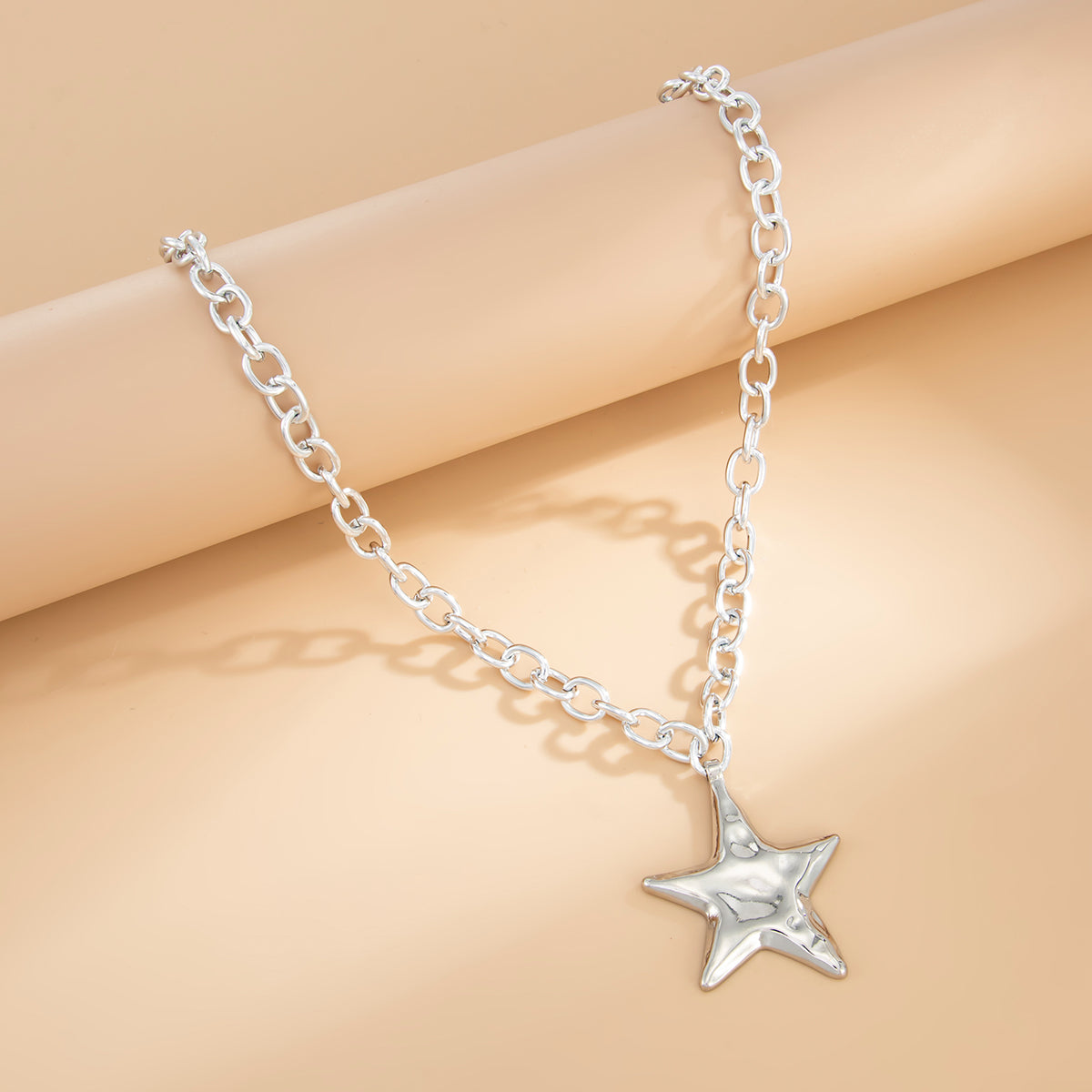Silvertone Hammered Heart Pendant Necklace, dainty minimalist design, side view