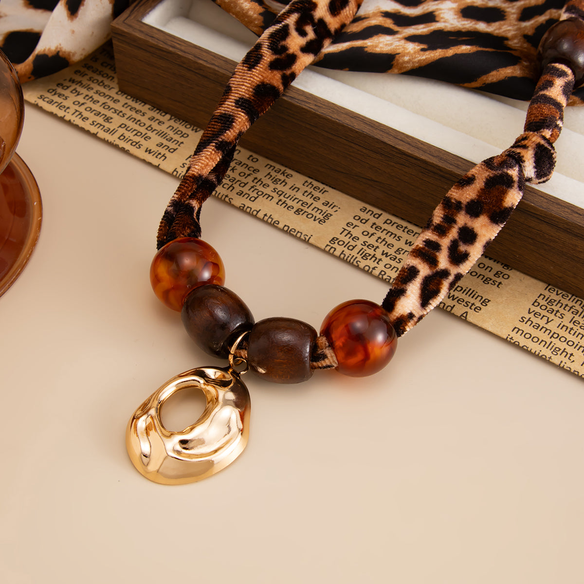 Polyster and Resin Wood Goldtone Pendant Leopard Print Necklace, vintage-inspired design, side view