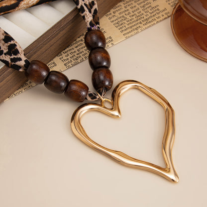Polyster and Wood Goldtone Open Heart Pendant Necklace, everyday style, detail close-up