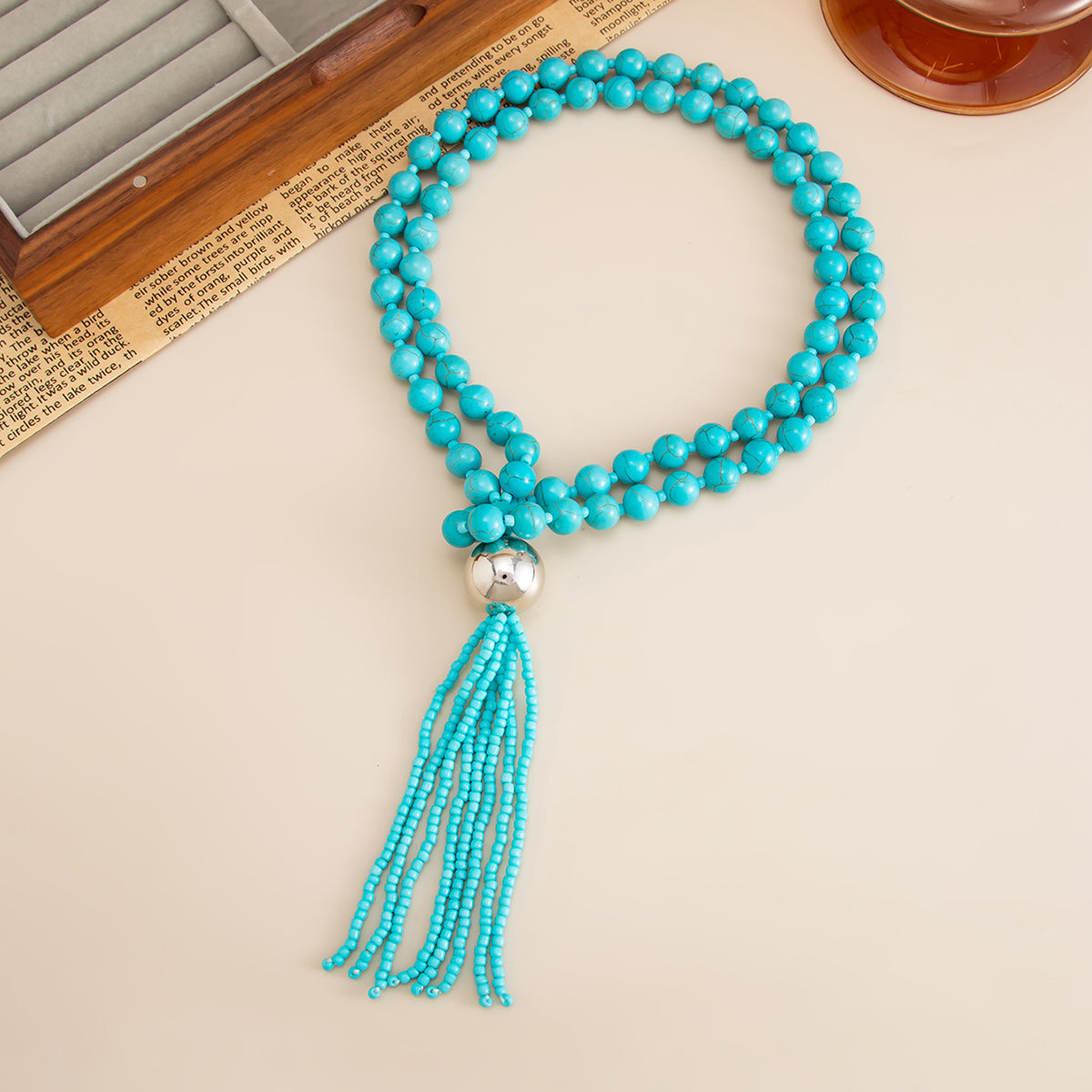 Blue Resin and Silvertone Big Ball Tassel Necklace, everyday style, side view
