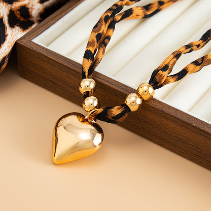Polyster and Goldtone Leopard Print Heart Pendant Necklace, everyday style, side view