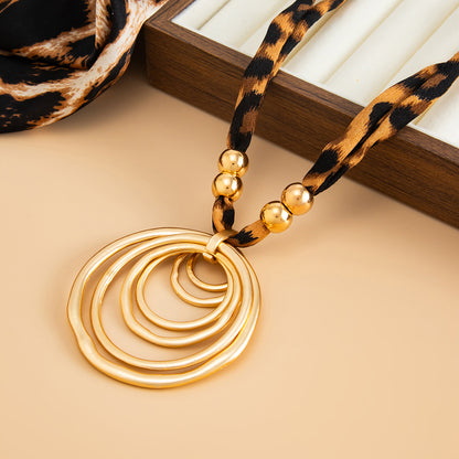 Polyster and Goldtone Leopard Print Ripple Pendant Necklace, elegant gift for her, side view