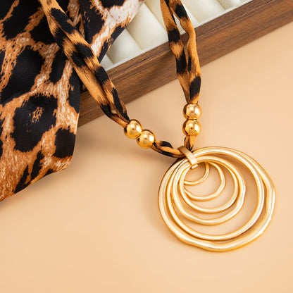 Polyster and Goldtone Leopard Print Ripple Pendant Necklace, elegant gift for her, detail close-up