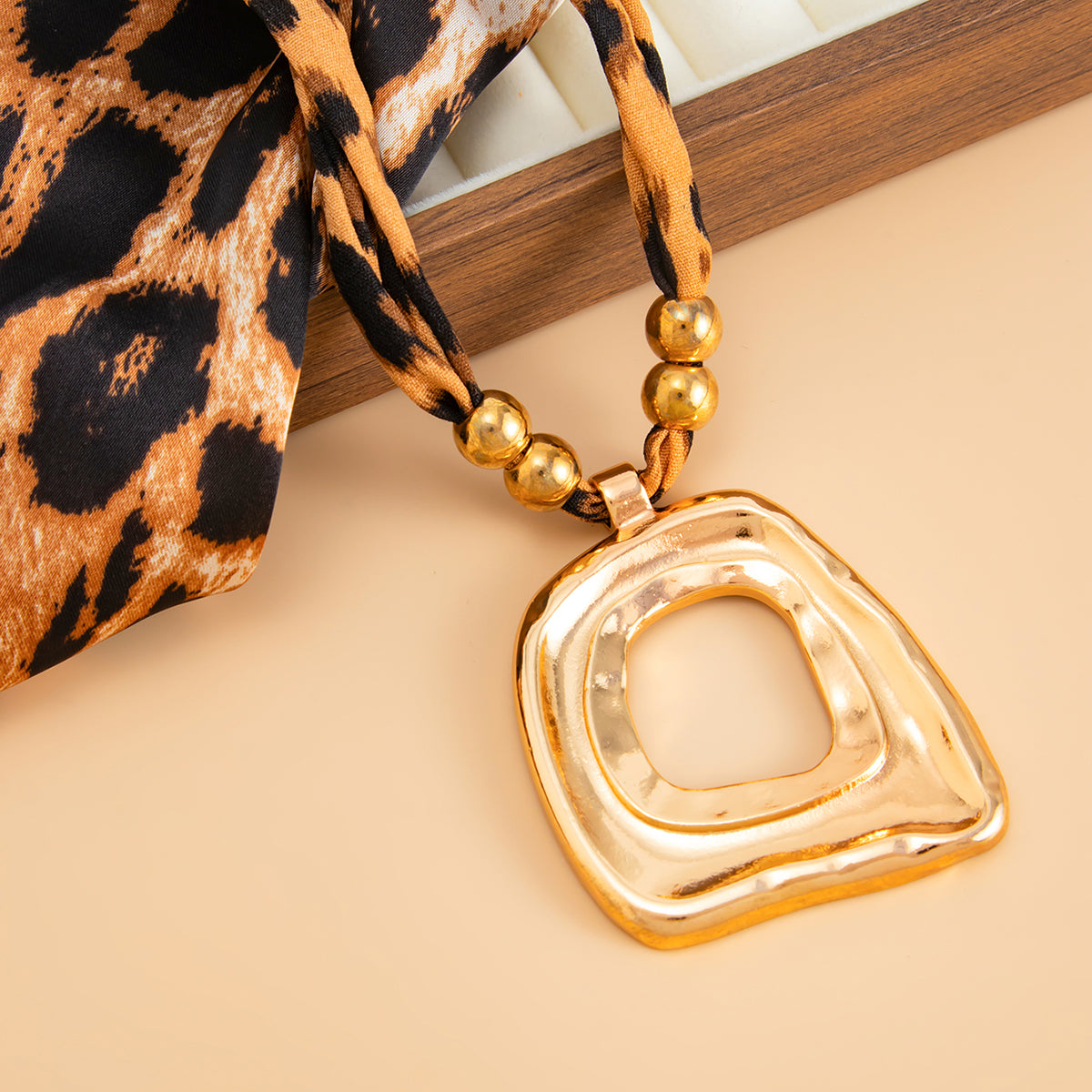 Polyster and Goldtone Leopard Print Open Trapezium Pendant Necklace, dainty minimalist design, side view