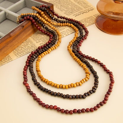 Multi-Colored Wood and Goldtone Beaded Chain Layered Necklace, everyday style, detail close-up